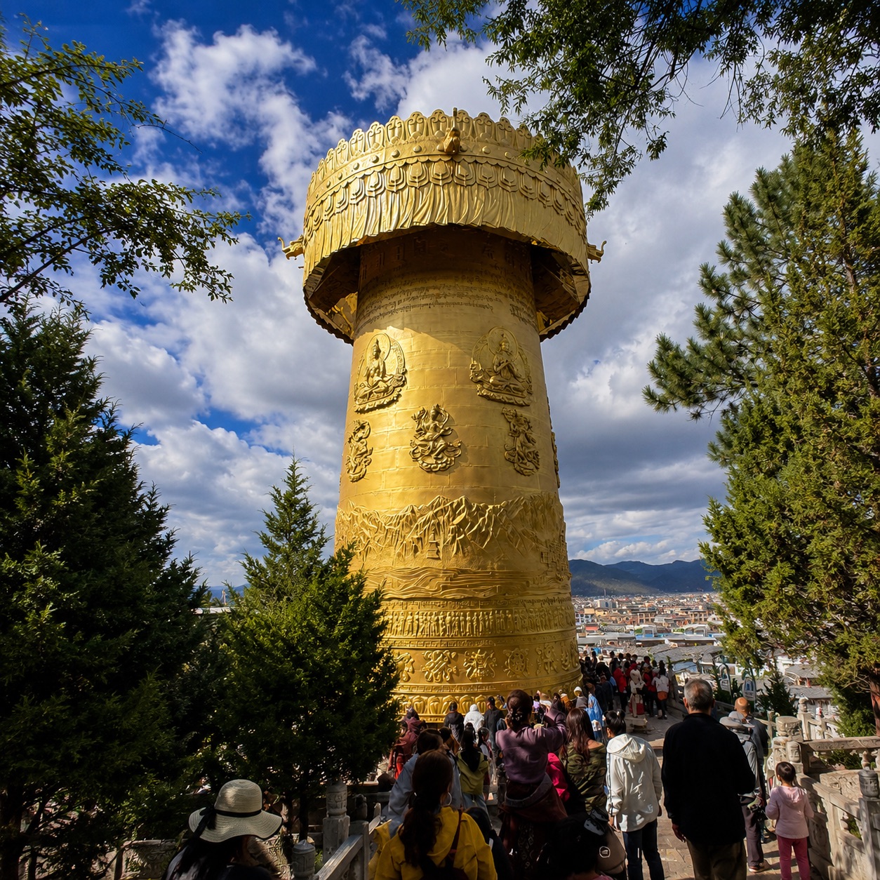 A monumental golden prayer wheel beneath a blue sky